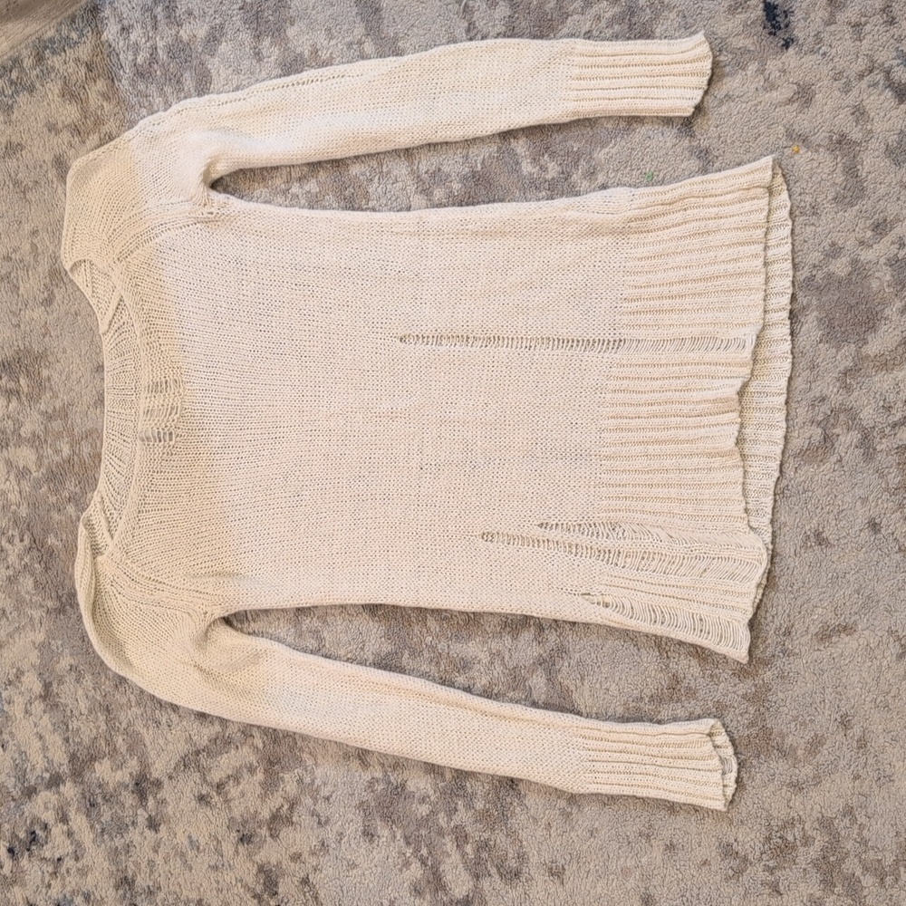 Distressed sweater